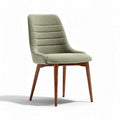 Upholstered dining chair in light green with wooden legs 45 x 50 x 85cm